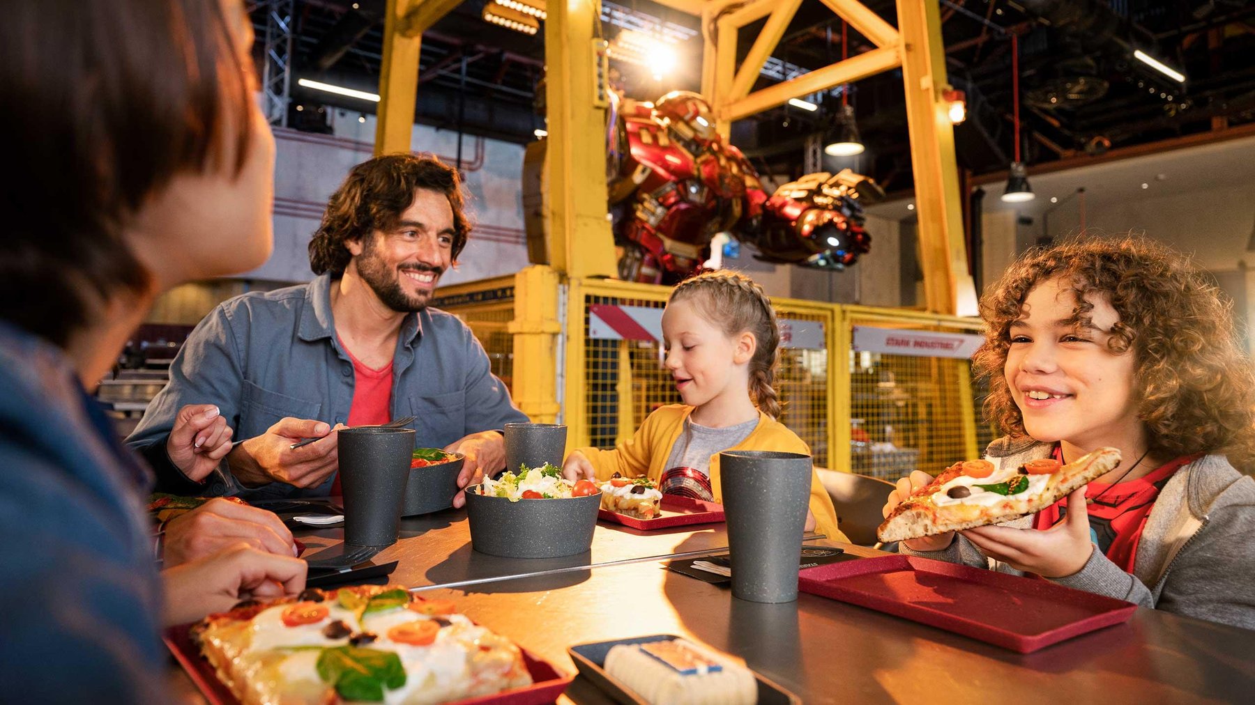 n038964_2027jul10_world_stark-factory-restaurant-lifestyle-family-pizza-pasta_16-9_tcm756-254795$p~1$f~jpg